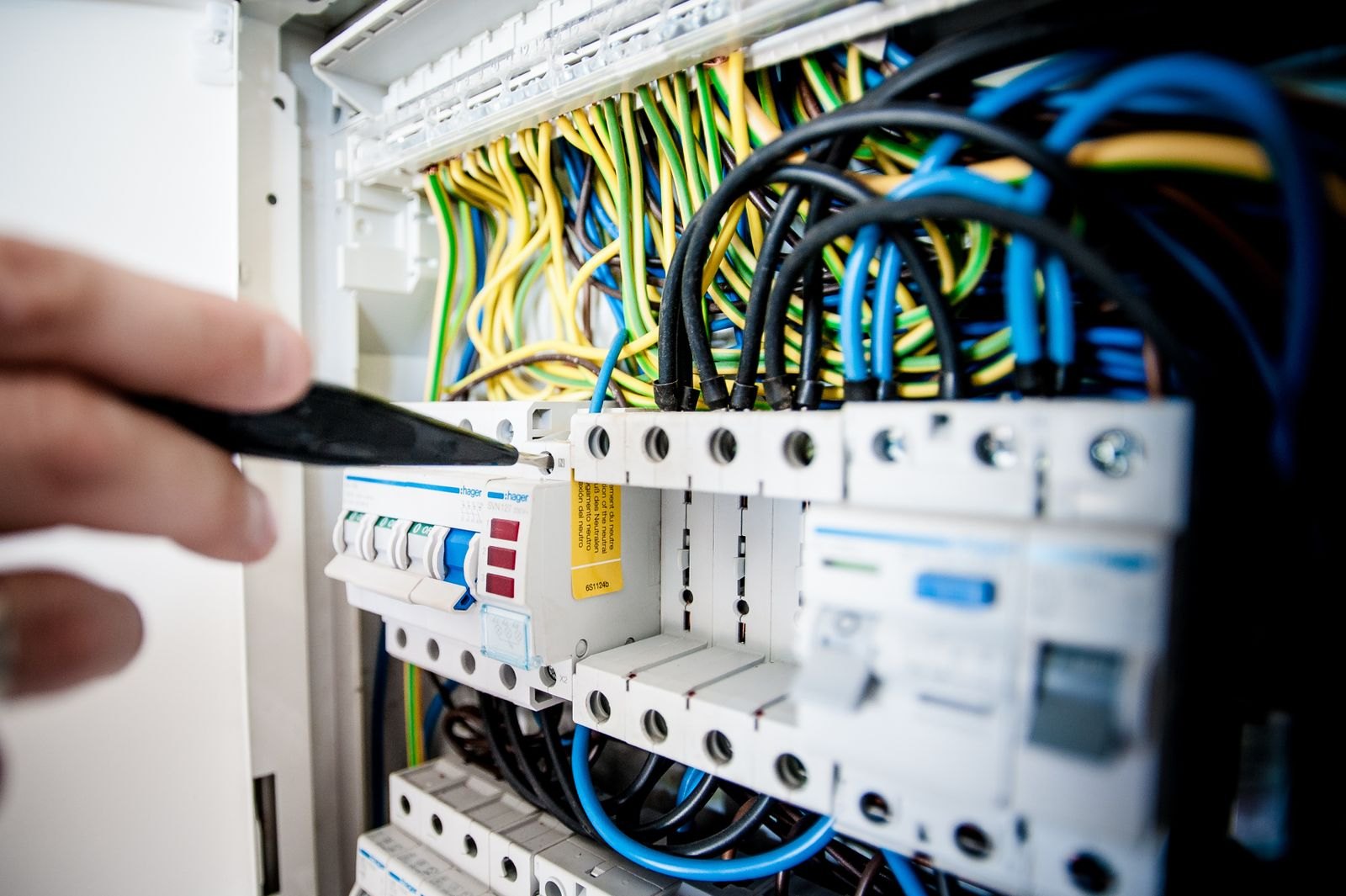 Close-up of circuit breakers and color-coded wiring