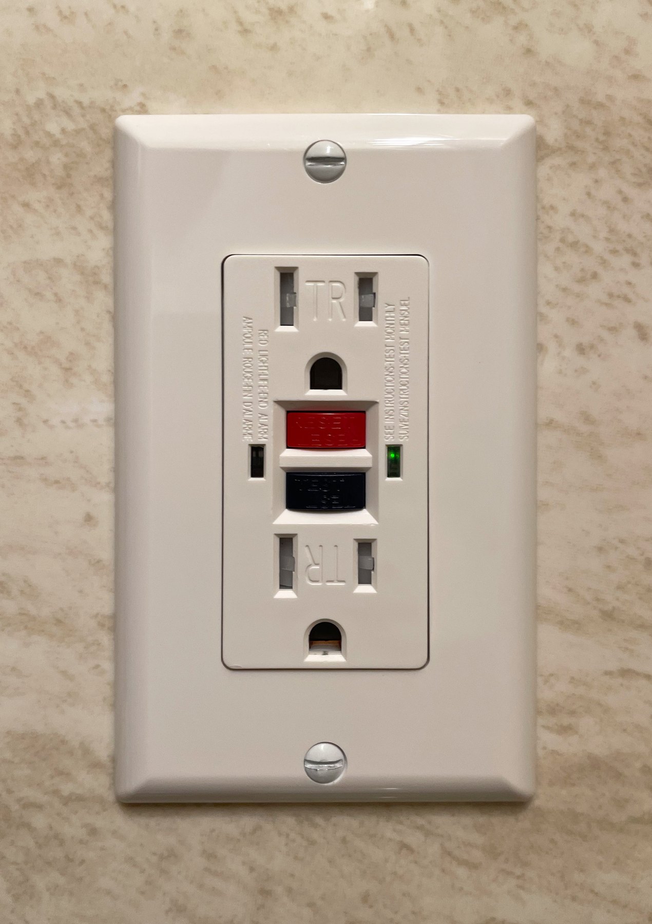 Installed GFCI receptacle with test and reset